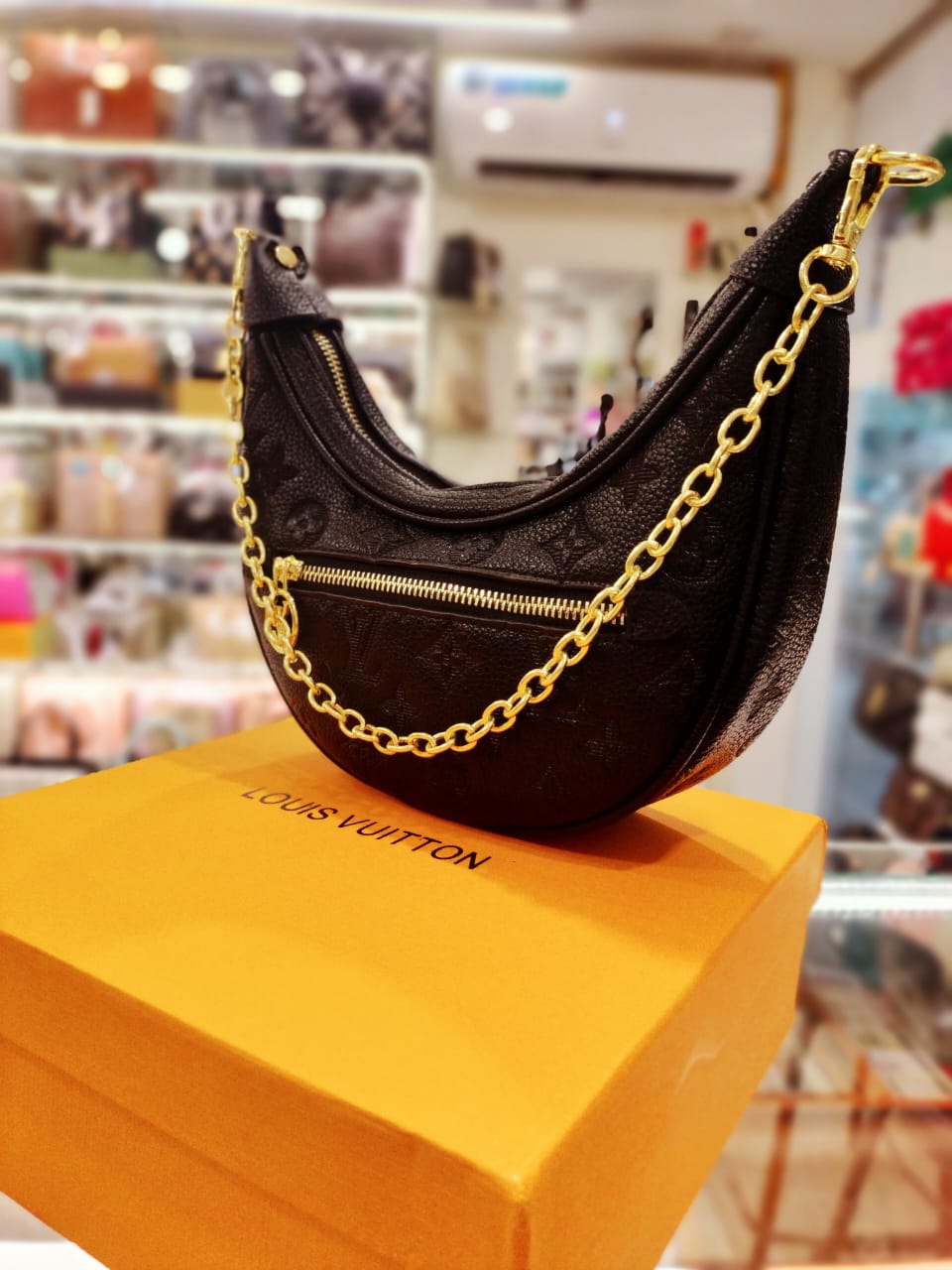 louis vuitton loop moon bag