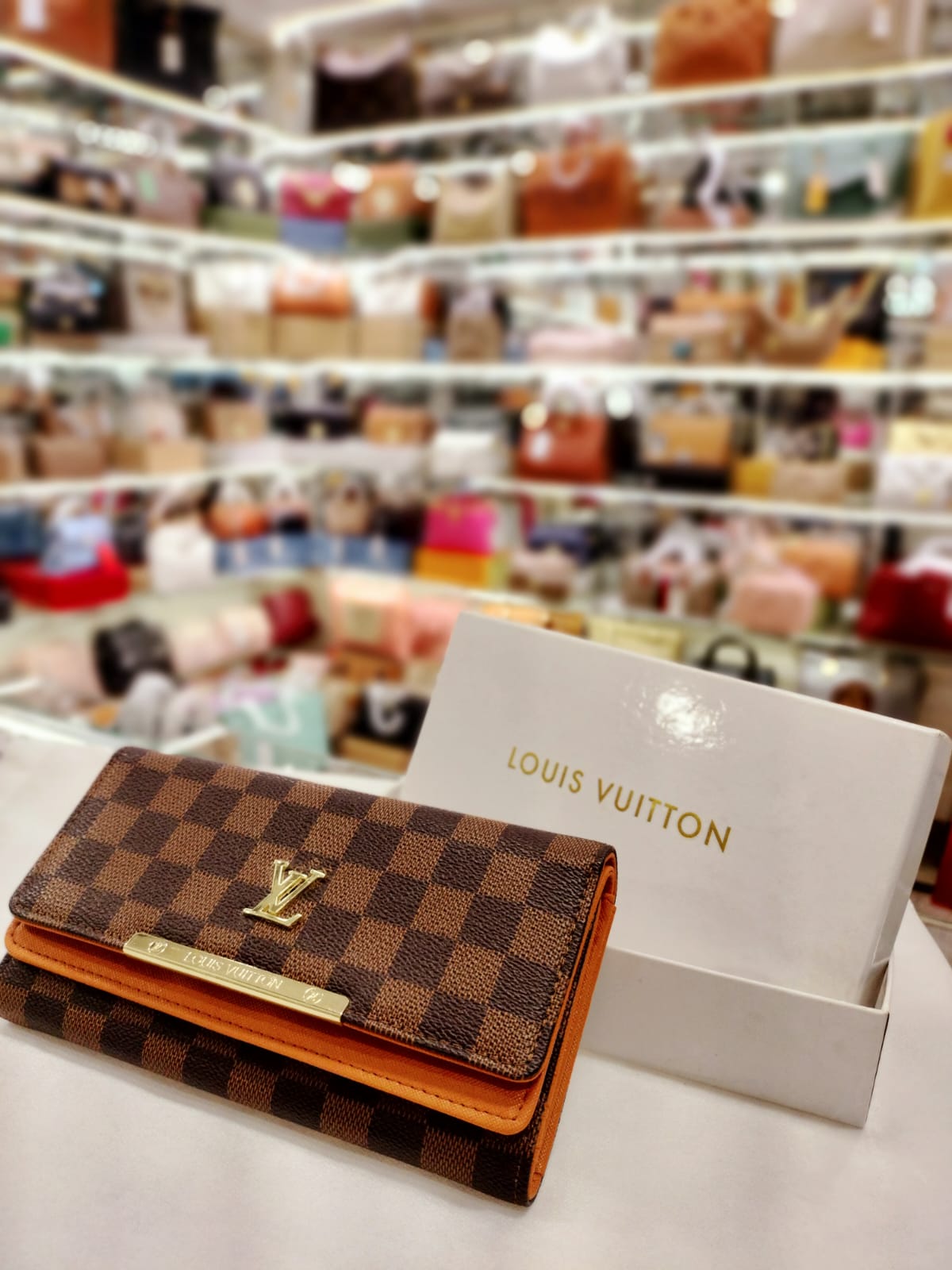 louis vuitton wallet brown with check design